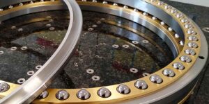 An image shows a large turntable bearing.