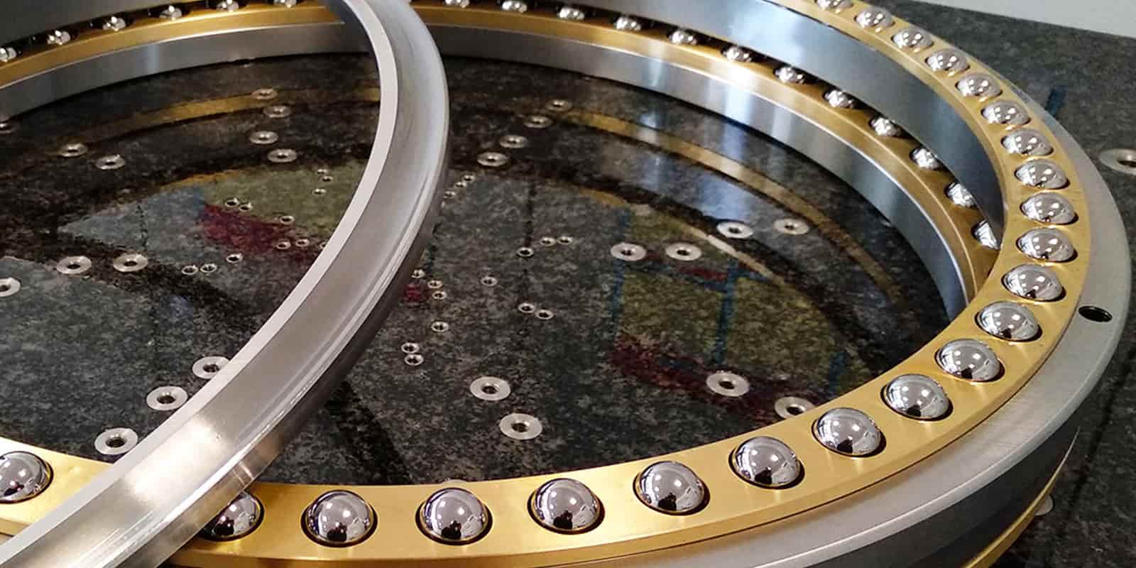 An image shows a large turntable bearing.