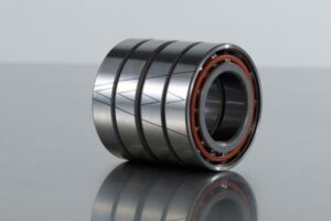 A close-up image of 4 high-precision angular contact bearings, with the Marks for Installation on the surface.