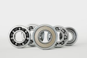 image displays several different deep groove ball bearings