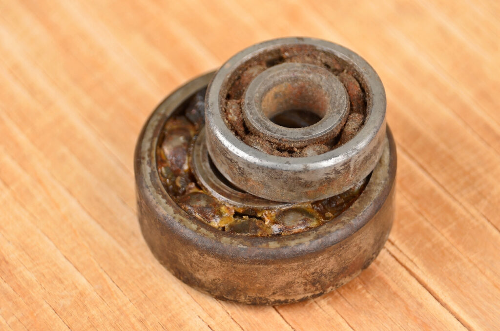 Two rusted and corroded bearings