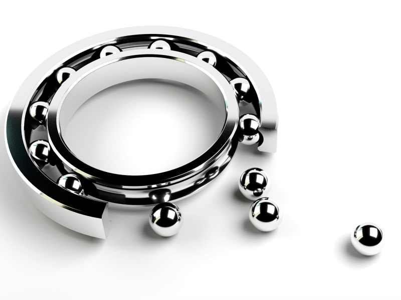 Illustration of materials used in high precision bearings including chrome steel and advanced coatings layered with aluminum or bronze linings