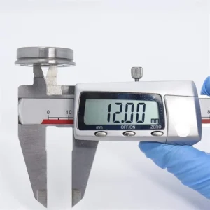 A caliper measure the bore of flanged bearing