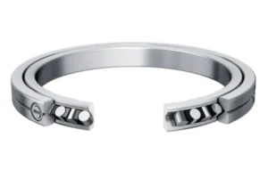 Close-up view of a cross roller bearing's internal mechanism, specifically highlighting the crisscross or orthogonal pattern of the cylindrical rollers designed for simultaneous radial, axial, and moment load support.