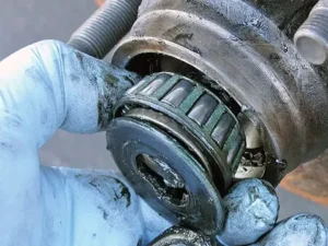 A bearing is being taken out for inspection