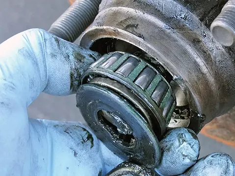A bearing is being taken out for inspection