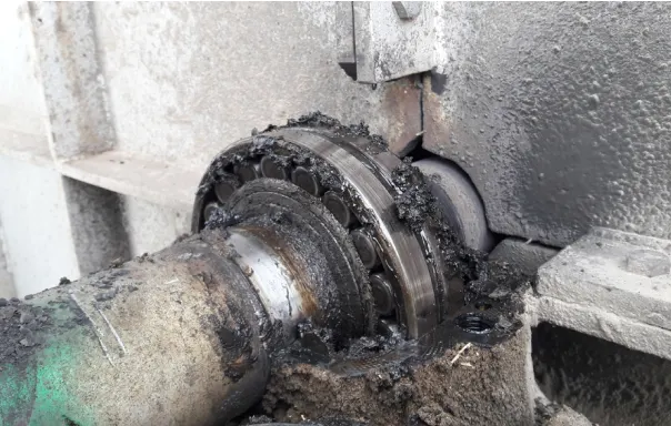 image shows the roller bearing failure caused by improper lubrication practices