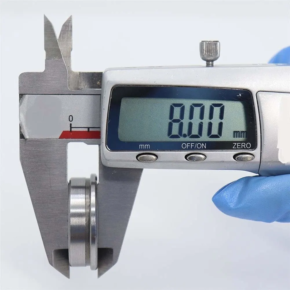 A caliper measure the width of flanged bearing