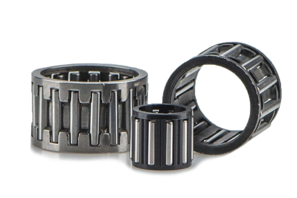 A close-up view of a needle roller bearing with its cage clearly visible, illustrating how the cage organizes the rollers.