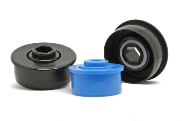 Plastic roller bearings integrated into food processing machinery, emphasizing their hygiene, resistance to cleaning agents, and compliance with FDA/NSF standards.