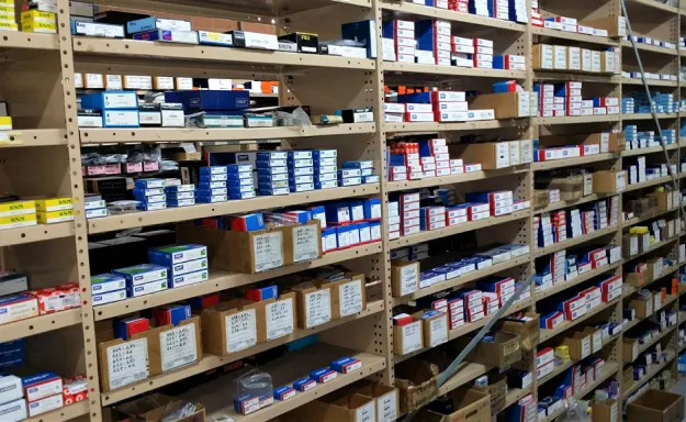 the image shows a warehouse full of bearings, bearing storages