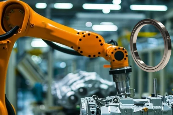 An image of a robotic arm, with a highlight on the joint where an RA crossed roller bearing would be used, emphasizing their use as robot bearings and for crossed roller bearing applications.
