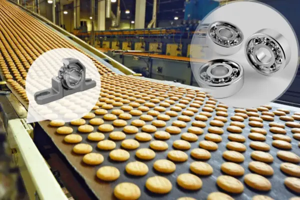 A worker inspecting a machine on a food production line, with a close-up on stainless steel roller bearings that resist corrosion and bacteria, ensuring safe machine operation.