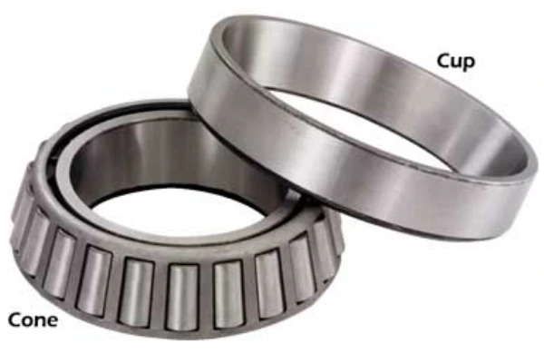 An exploded view of a tapered roller bearing, highlighting the imperial single cup, rollers, and cone, illustrating their interrelationship.