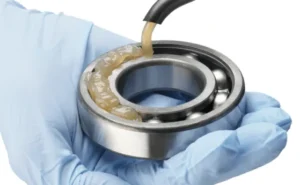 image shows adding lubricant for bearing