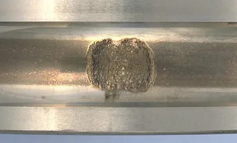 image shows a bearing spalling on outer ring