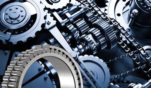 A close-up of heavy industrial machinery gears, indicating the presence and use of robust double row full complement cylindrical roller bearings.