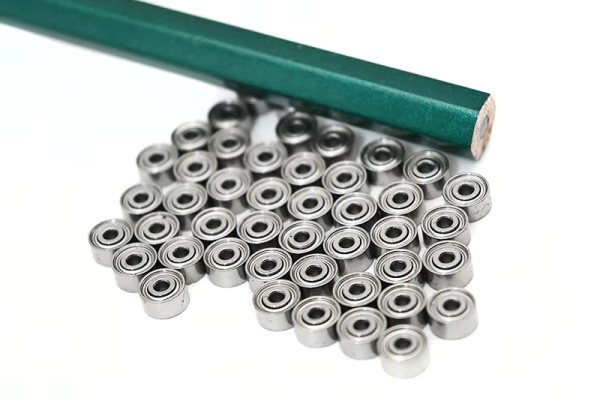  Small scale miniature ball bearings used in robotics and medical instruments.
