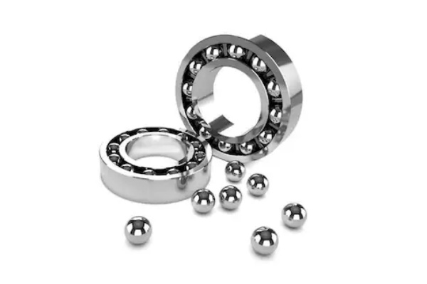 A durable angular contact ball bearing operating under heavy axial and radial loads.