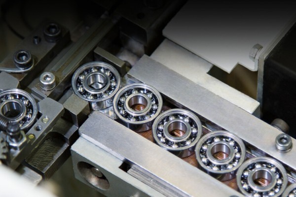 Assortment of SDTFL ball and roller bearings demonstrating brand versatility