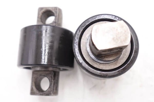 Assorted sizes of mast guide bearings displayed for industrial forklift applications.